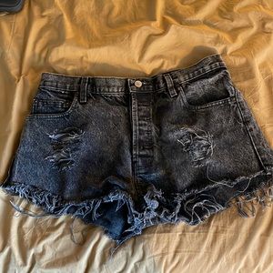 Levi 501 black distressed shorts